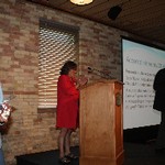 Dr. Diane Kimoto Bonetti presenting awards to CAC members